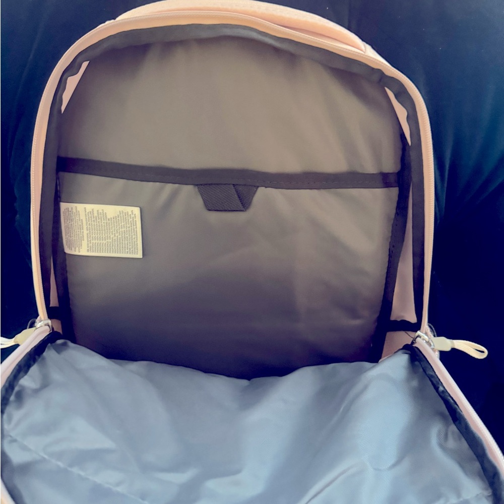 North face pink laptop backpack. Used about a month for work. Great backpack.